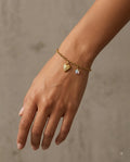 Celestial Heart Charm Bracelet worn on wrist