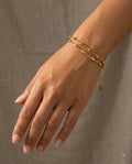 Golden Bead & Bar Bracelets worn on wrist